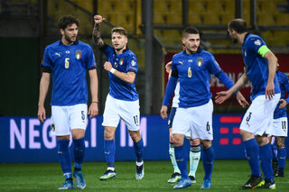 Italy's forward Ciro Immobile (2ndL) celebrates after scoring the second goal during the FIFA World Cup Qatar 2022 Group C qualification football match between Italy and Northern Ireland on March 25,