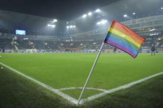 rainbow corner flag during a soccer match