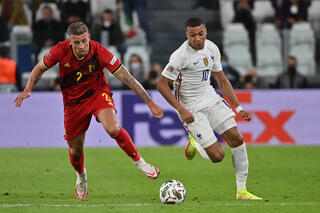 Belgium's Toby Alderweireld and France's Kylian Mbappe fight for the ball during a soccer game between Belgian national team Red Devils and France, the semi-finals of the Nations League, in Torino, It