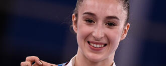 Nina Derwael bezorgt België delirium met eerste gouden medaille in Tokio