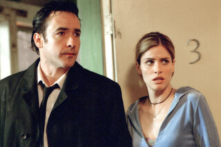 John Cusack et Amanda Peet dans 'Identity'