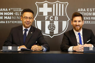 Josep Bartomeu en Lionel Messi
