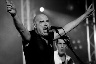 Ludo Mariman op het podium met The Kids