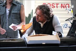 Nicolas Cage eating Pizza