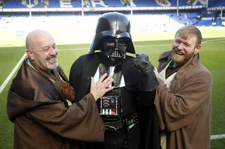 Fans dressed as Star Wars characters arrive ahead of the match  Everton