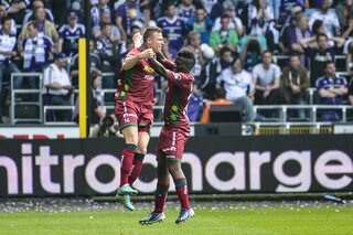 Essevee's Jens Naessens (L) celebrates after scoring the 0-1 goal during the Jupiler Pro League match of Play-Off 1, between RSC Anderlecht and Zulte Waregem, in Brussels, Sunday 19 May 2013, on the l