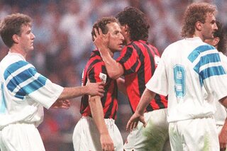 File photo dated 27 May 1993 of former AC Milan striker Jean-Pierre Papin (C) restrained by teammate Paolo Maldini (2nd R) and Olympique Marseille player Didier Deschamps (L) during the European Champ