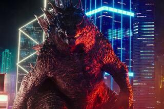 Godzilla avant de trébucher sur un building